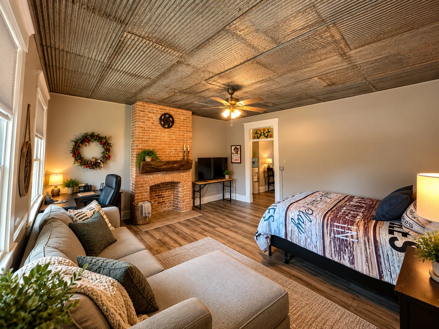 The tin-ceiling living and sleeping area, artistically styled